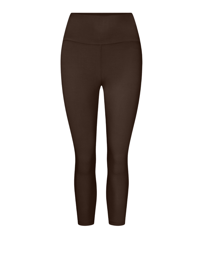 A pair of high-waisted, 3/4  length leggings in a dark brown shown on a plain white background.