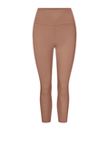 A pair of high-waisted, 3/4  length leggings in a solid warm tan shown on a plain white background.