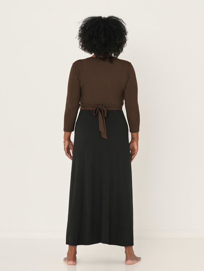 Model wearing a cocoa brown ballet wrap cardigan with plunge neckline and fitted 3/4 sleeves, women's bamboo clothing