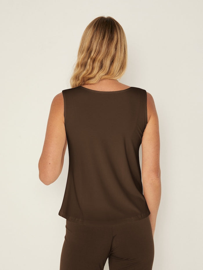 Model wearing a cocoa brown boat neck singlet with wide shoulder coverage, women's bamboo clothing