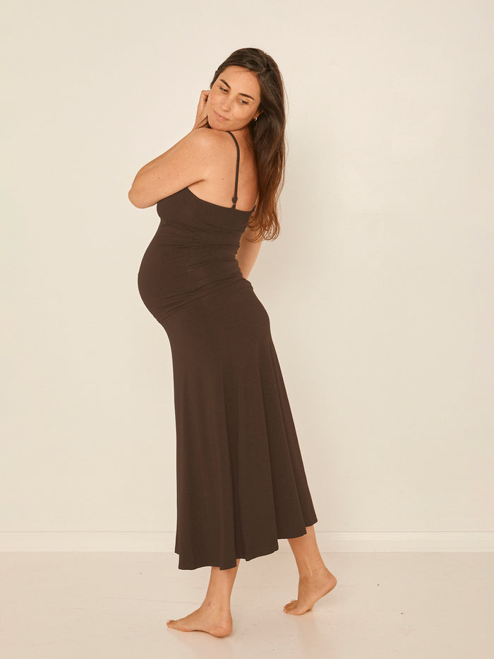 Model wearing cocoa brown body singlet with in-built bralette, subtle v front and adjustable straps, women's bamboo clothing