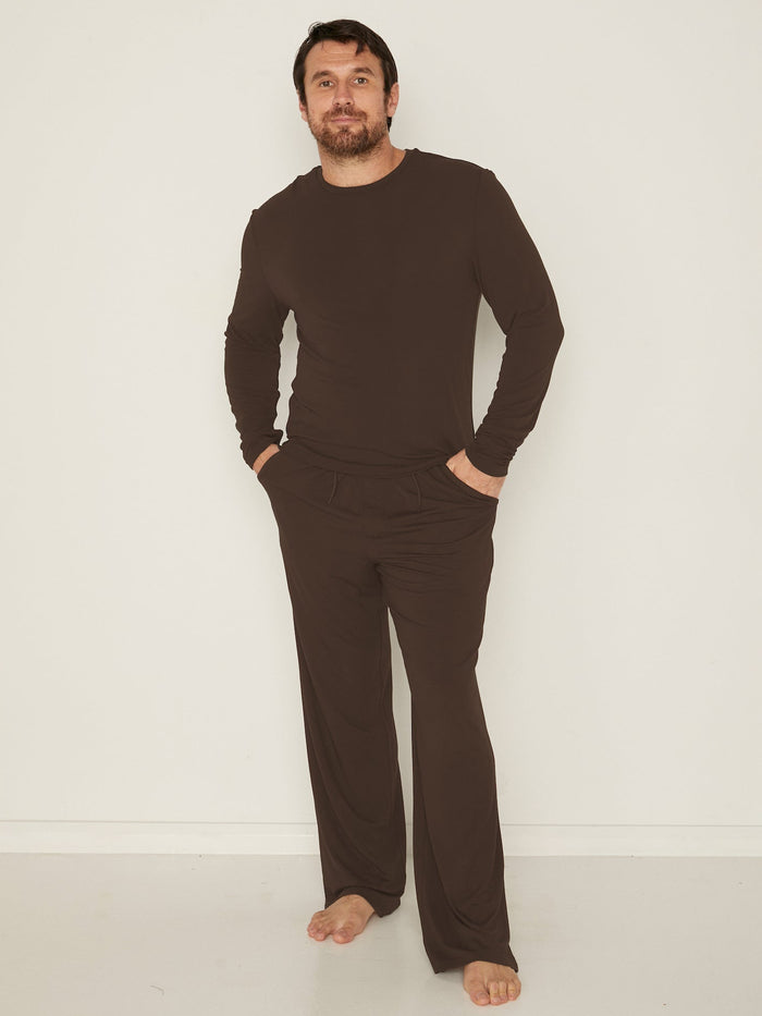 Male model wears Bamboo Casual Pants and Men's Long Sleeve  Tee in Cocoa