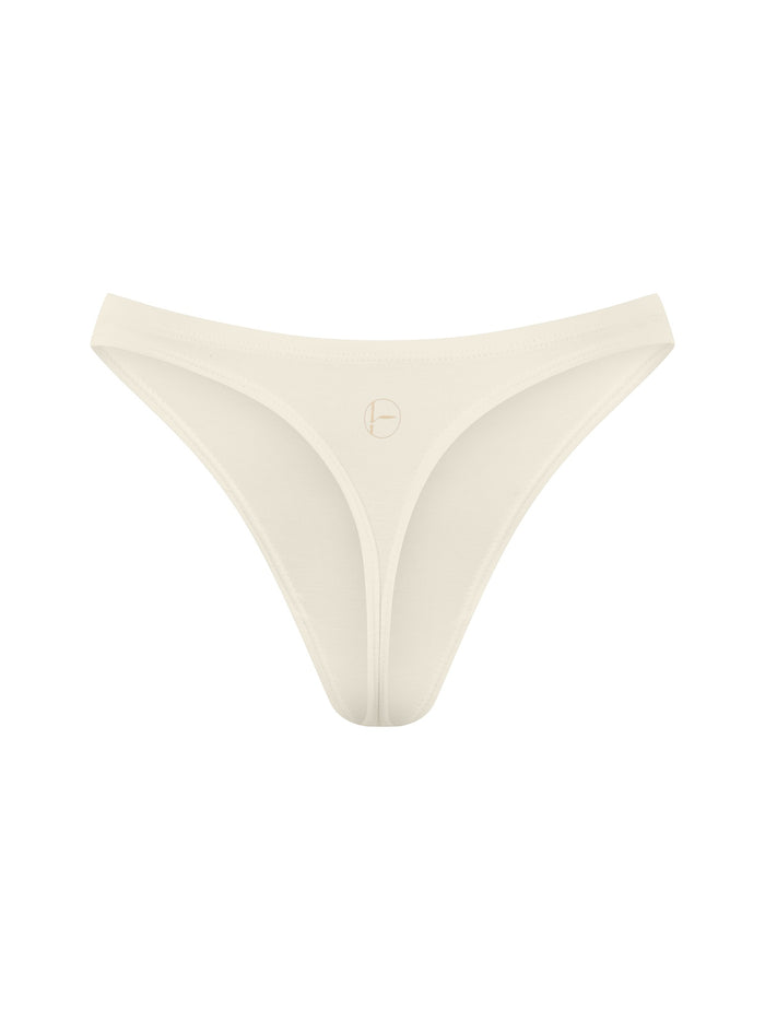 Bamboo cream classic thong g-string underpants on a white background