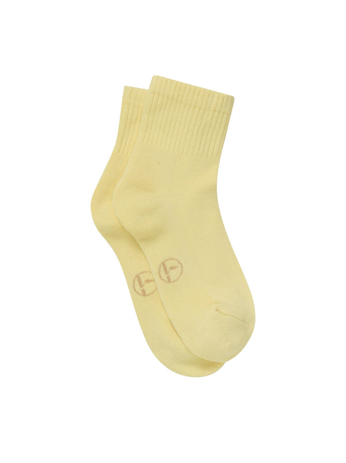 Yellow bamboo socks on a white background