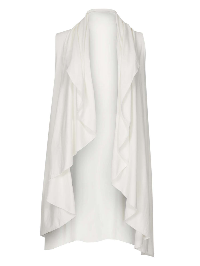 Model wearing a cream convertible style goddess wrap; long cardi, vest or poncho, women's bamboo clothing