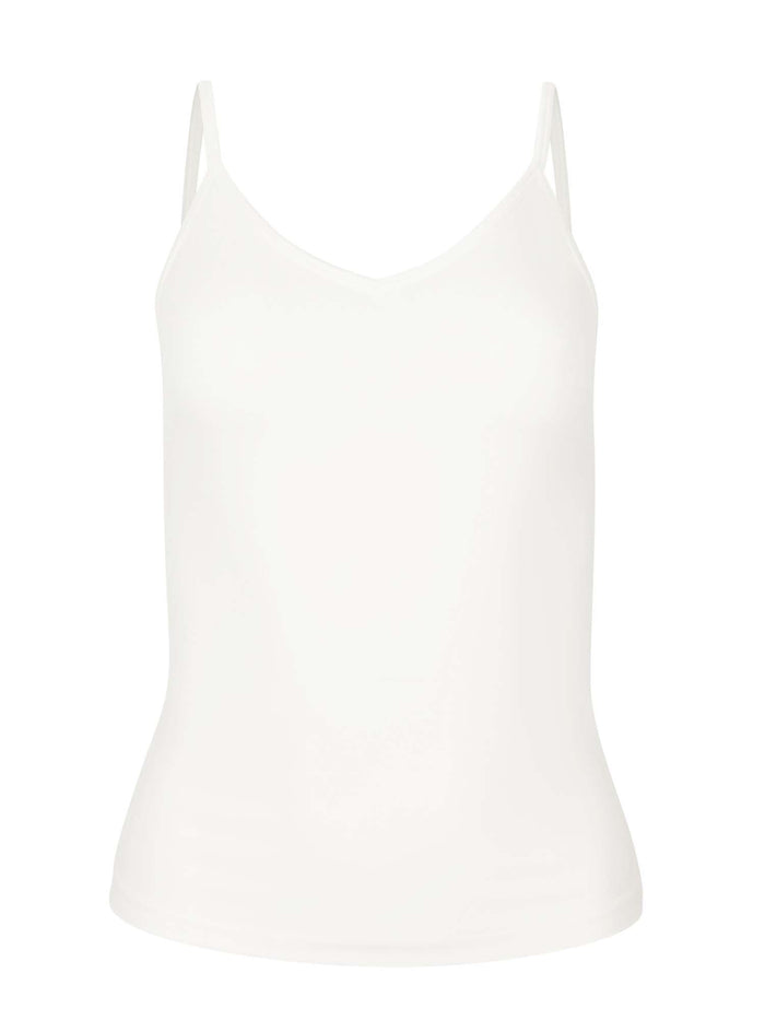 Model wearing a cream layering singlet with camisole straps, v neckline and fitted body, women's bamboo clothing