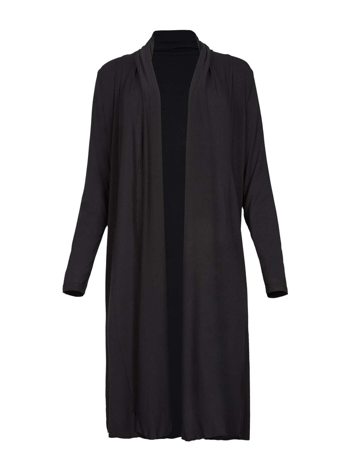 Model wearing black long cardigan, below knee length jacket with long fitted sleeves, women's bamboo clothing