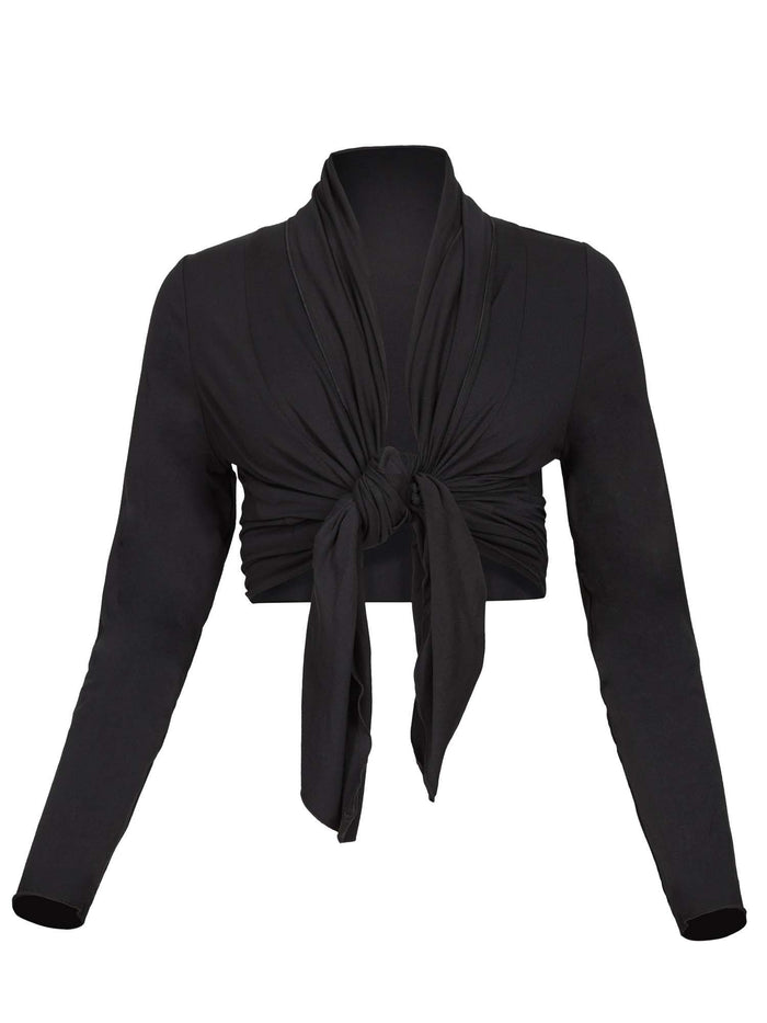 Model wearing convertible black mid cardigan, worn tied at front or worn open with long fitted sleeves, women's bamboo clothing