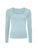 Light blue long-sleeve top on a white background