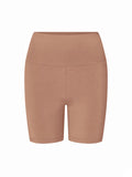 A pair of high-waisted, seamless biker shorts in a toffee tan brown, shown against a plain white background.