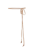 Model wearing caramel brown long thin string belt with brown wooden bead tied at both ends, women's bamboo clothing accessories