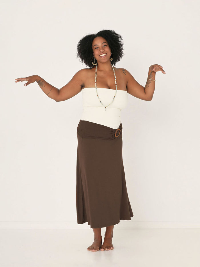 Model wearing cocoa swing style long swishy skirt, mid - low calf length, double layered deep waistband, women's bamboo clothing