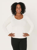 Model wearing a reversible cream fitted body, long sleeve t-shirt with v and boat necklines, women's bamboo clothing