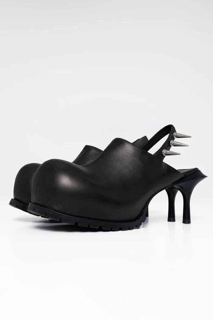 BLACK-DOUBLE-HEELED-MULES-WITH-SPIKE-DETAIL-ON-BACK-STRAP-THREE-QUARTER-VIEW