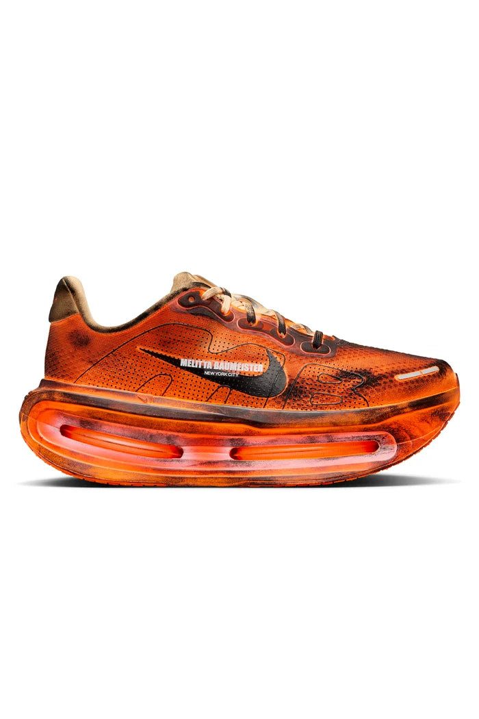Orange and black sneaker on white background