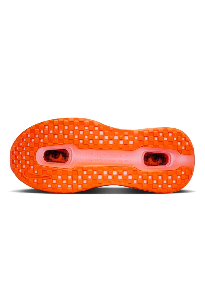 Orange and black sneaker on white background
