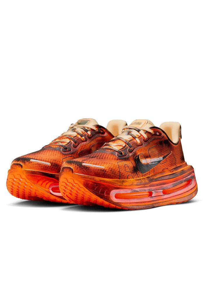 Orange and black sneaker on white background