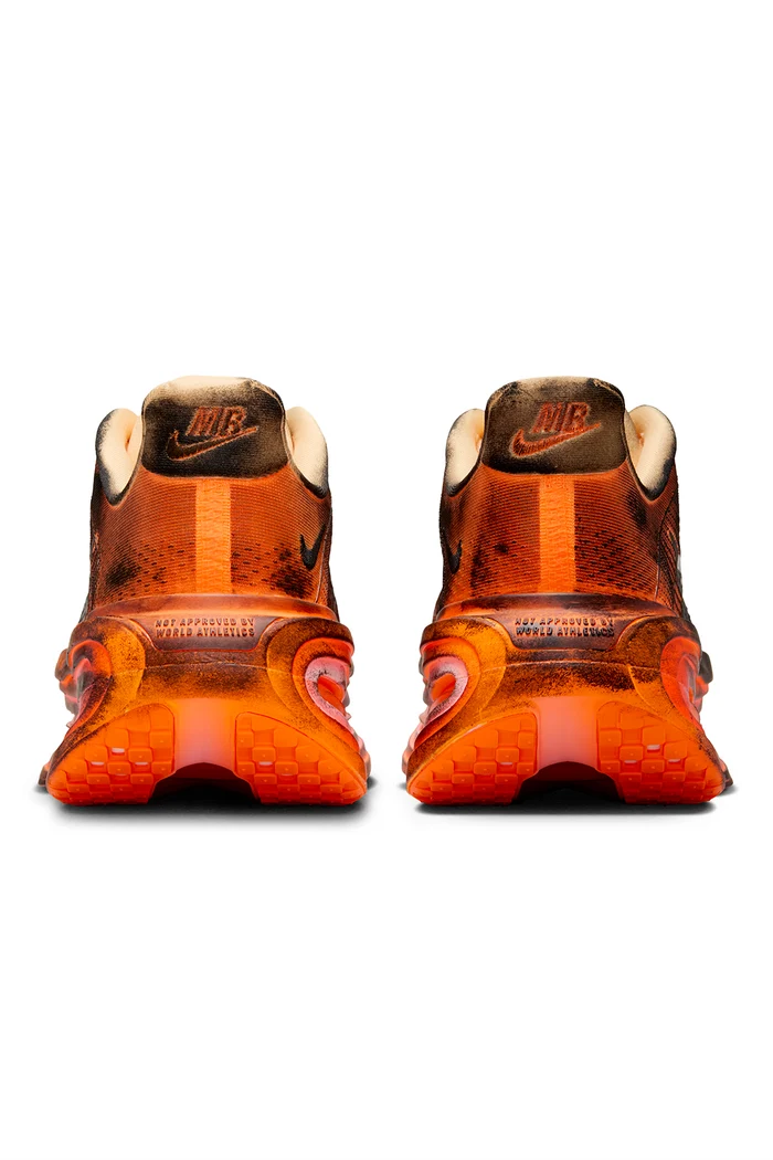 Orange and black sneaker on white background