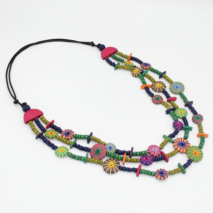Colorful beaded necklace on a white background
