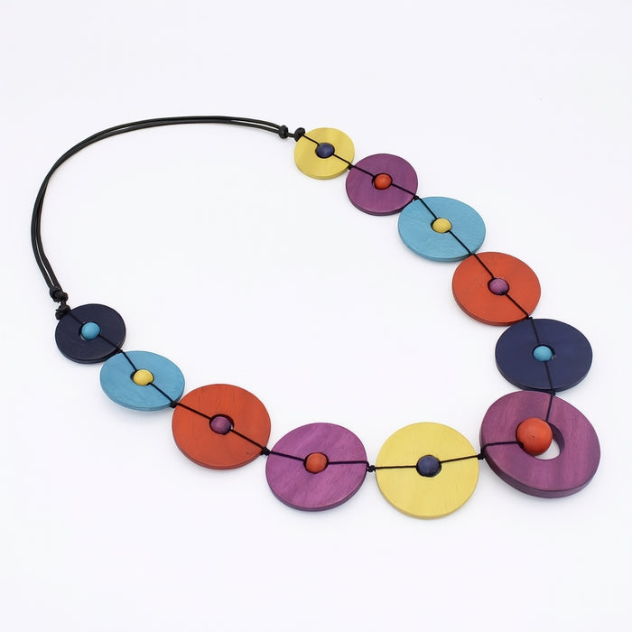 Colorful necklace with circular beads on a white background