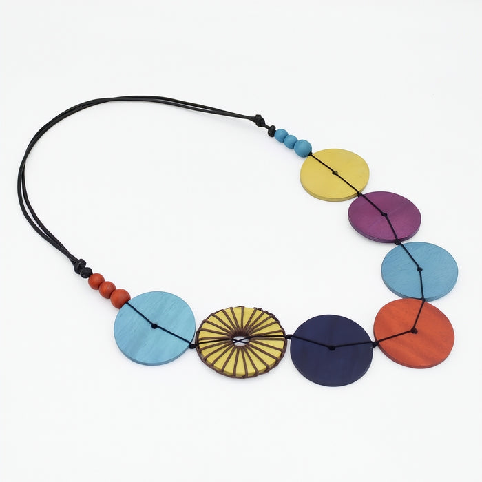 Colorful necklace with circular beads on a white background
