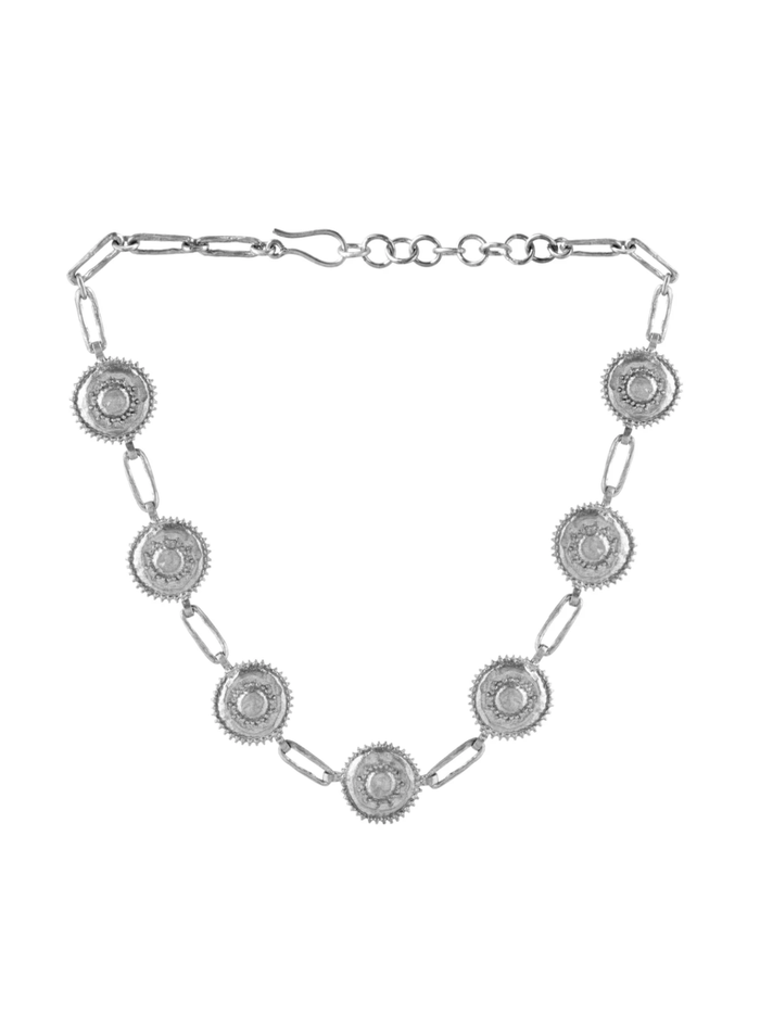 Silver chain necklace with circular pendants on a white background