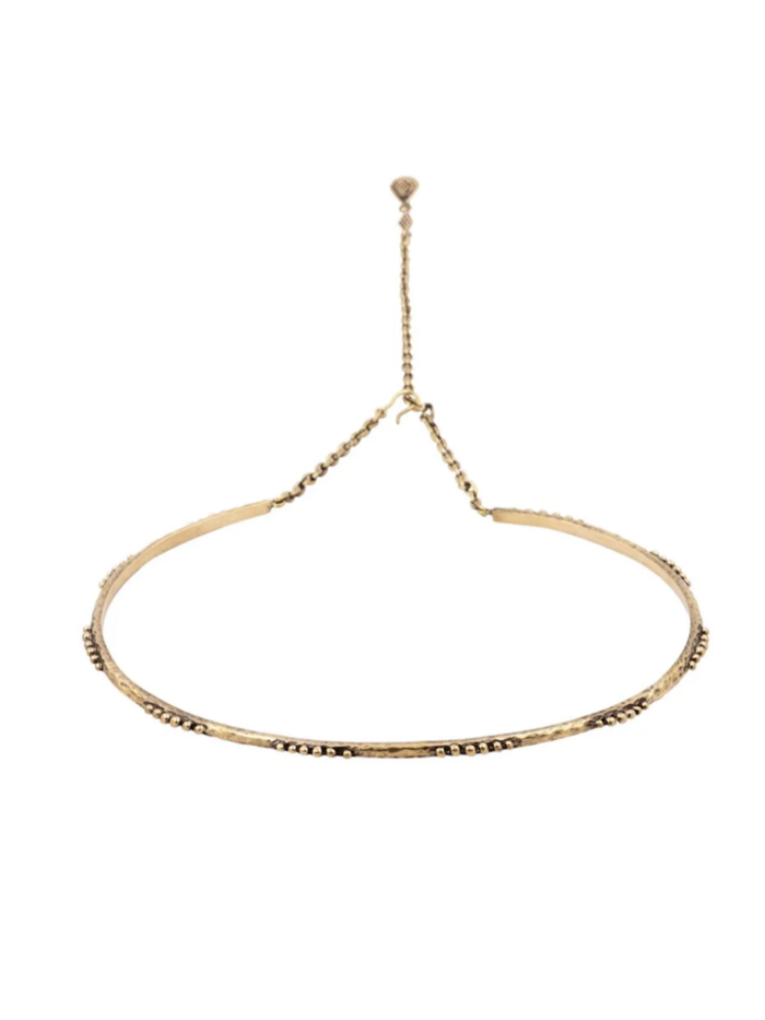 Brass chocker necklace on a white background