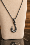 Njord necklace featuring a stainless steel fish hook pendant on a 23-inch box chain.