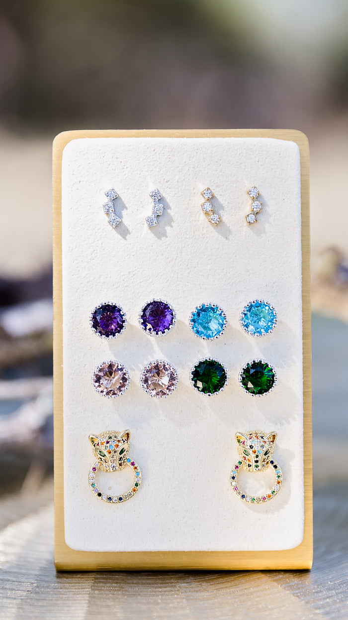 Onça jaguar stud earrings (bottom) displayed with Brooke Studs (middle)