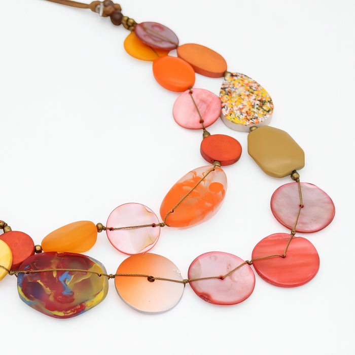 Colorful beaded necklace on a white background