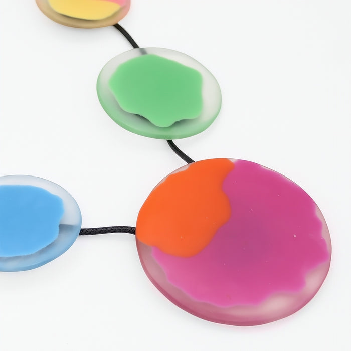 Colorful round objects on a white background