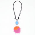 Necklace with a colorful pendant on a white background