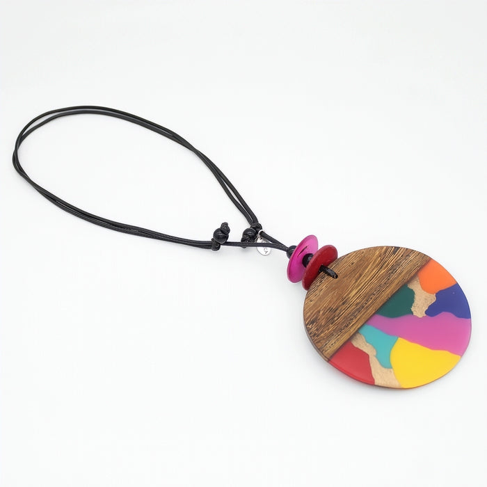 Necklace with a colorful pendant on a white background