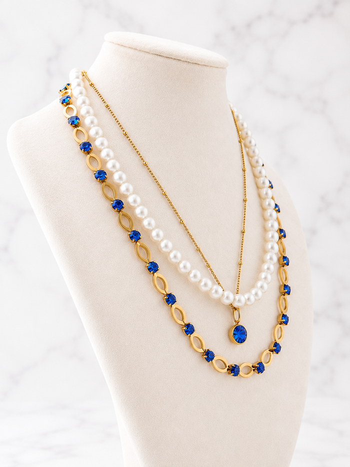 Styled Photo featuring Classic Birthstone Necklace and Poolside Luxe Necklace with Pearl Necklace and Pearl Necklace