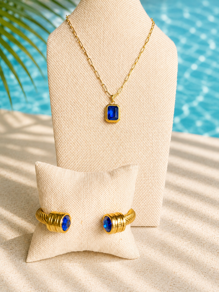 Styled look showing the 2026 Poolside Collection by Veita featuring Romy Cuff in Bright Blue and Nightfall Necklace in Blue.
