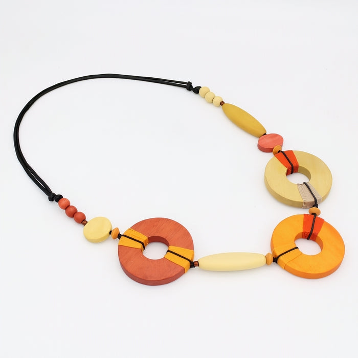Colorful necklace with circular beads on a white background